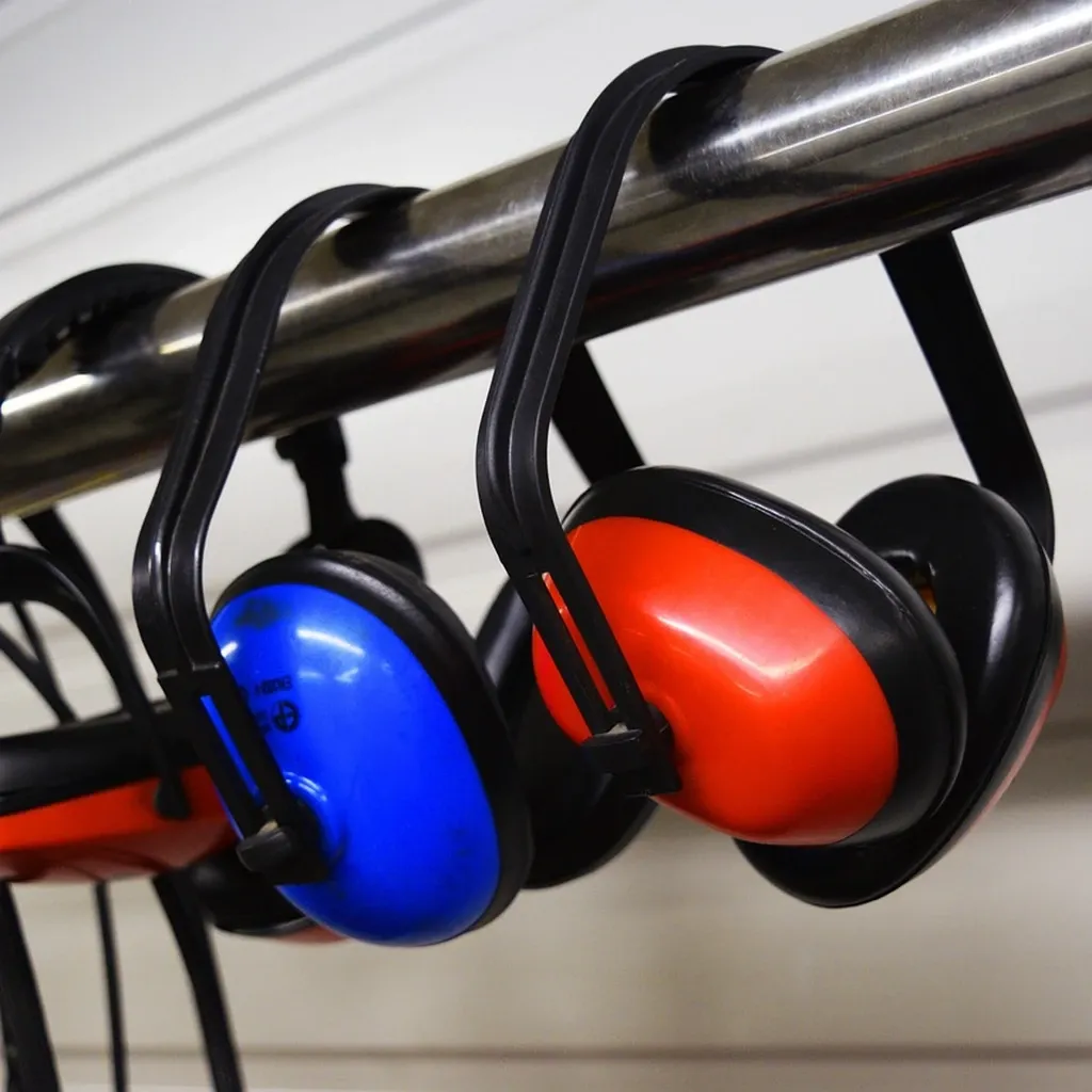 Hearing protection earmuffs Red and blue safety earmuffs used for hearing protection