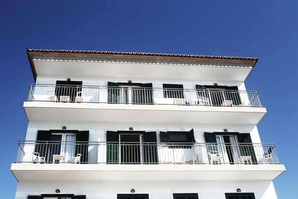 Apartment building facade with multiple balconies