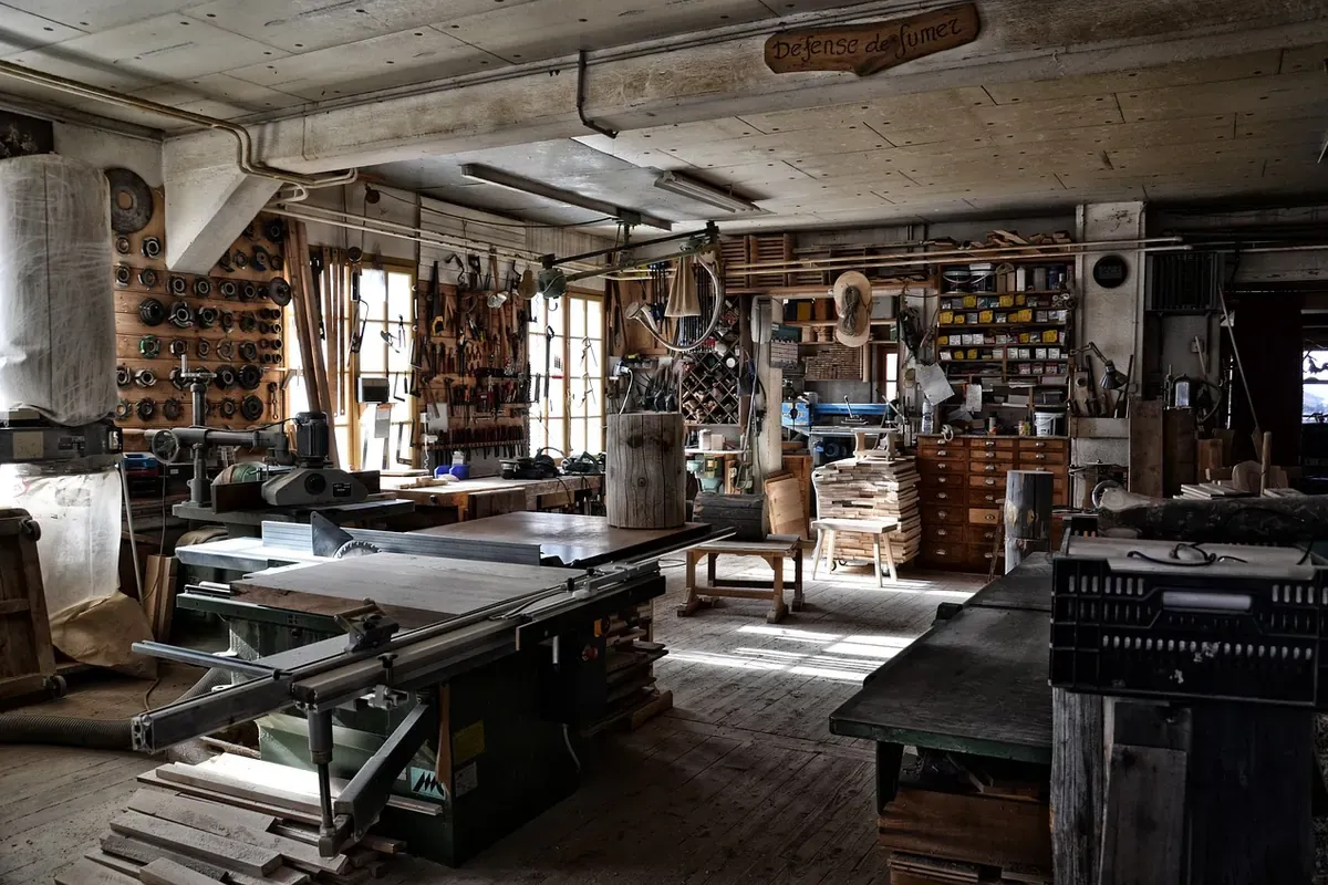 Small home workshop with tools stored on the wall